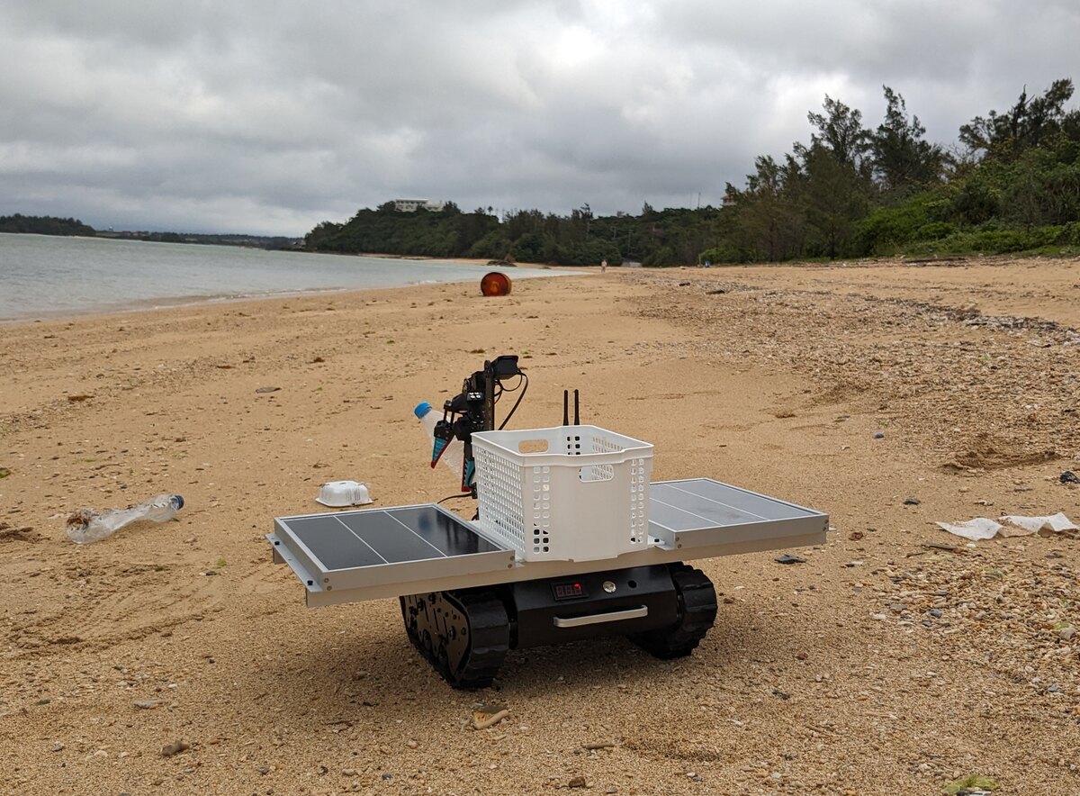 Beach robot viewed from behind on a shoreline.